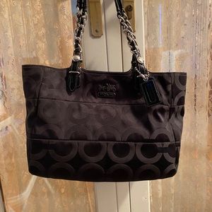 Coach bag. Black canvas signature design.